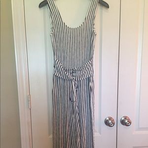 Striped casual jumpsuit w/ tied belt